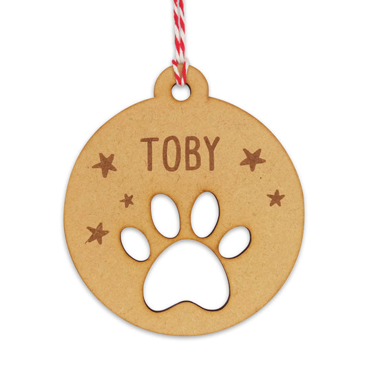 Bola de Navidad de madera personalizada con una huella de perro cortada